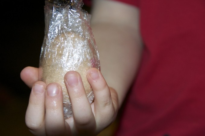 unbreakable egg wrapped in cling film