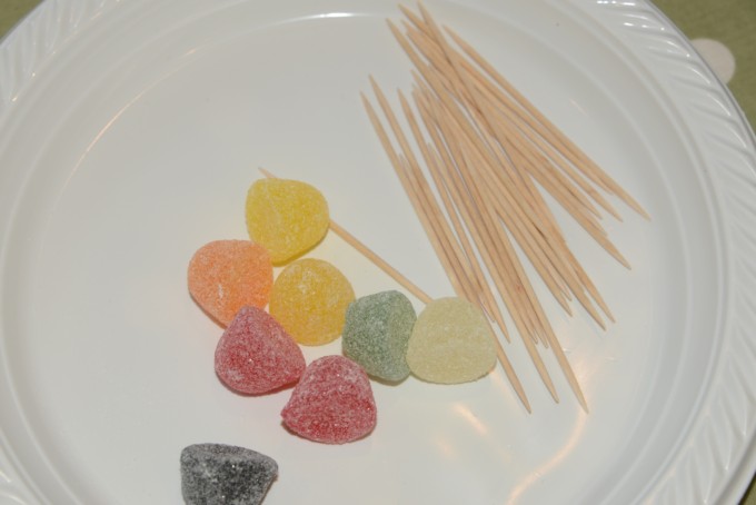 earthquake science experiment using candy towers in different edible foundations.