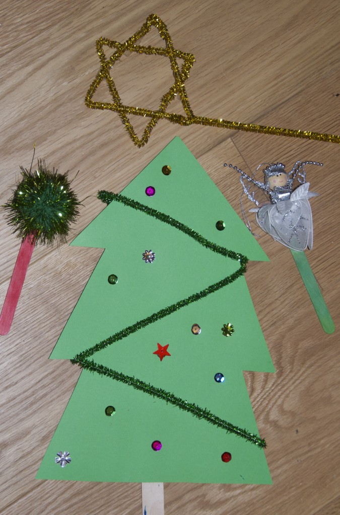 shadow puppets Large cardboard Christmas tree for a festive shadow puppet activity