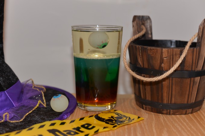 Wizard Potion made with different density liquids in a glass