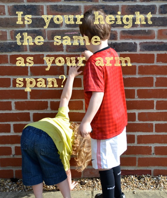 How to calculate arm span - image shows a child bent over reaching up to measure their wingspan.