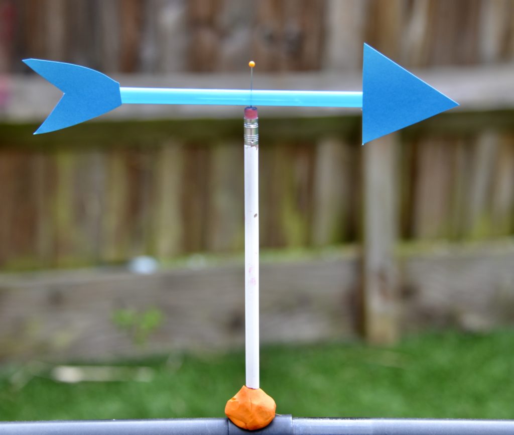 homemade wind vane made with a pencil, straw and cardboard